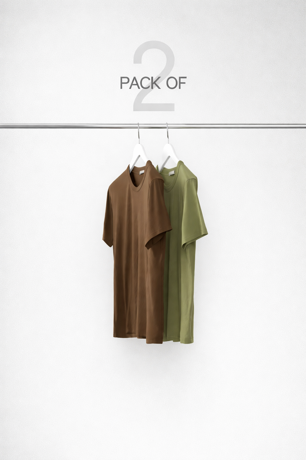 Two shirts, one brown and one green, hanging on a rack with '2 of' text above.